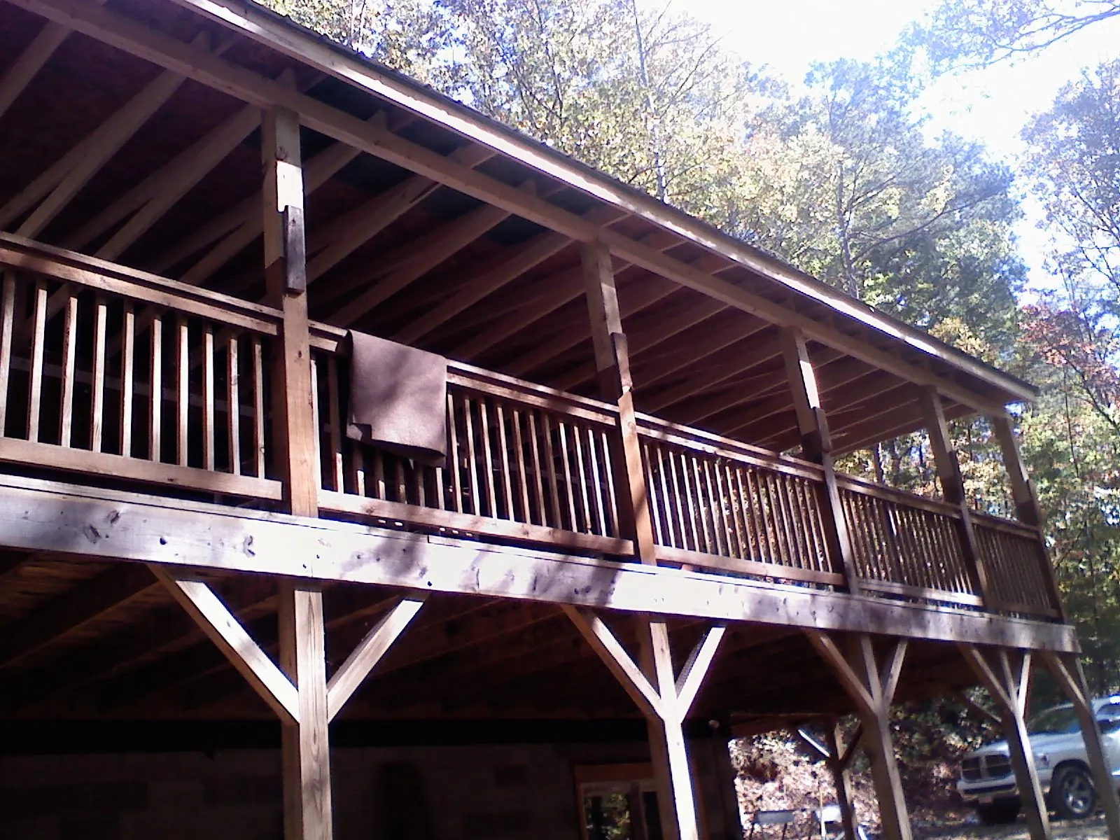 Timber framing under a new elevated porch and deck — Roof Leak Repair in Sartell by Roofing Brothers